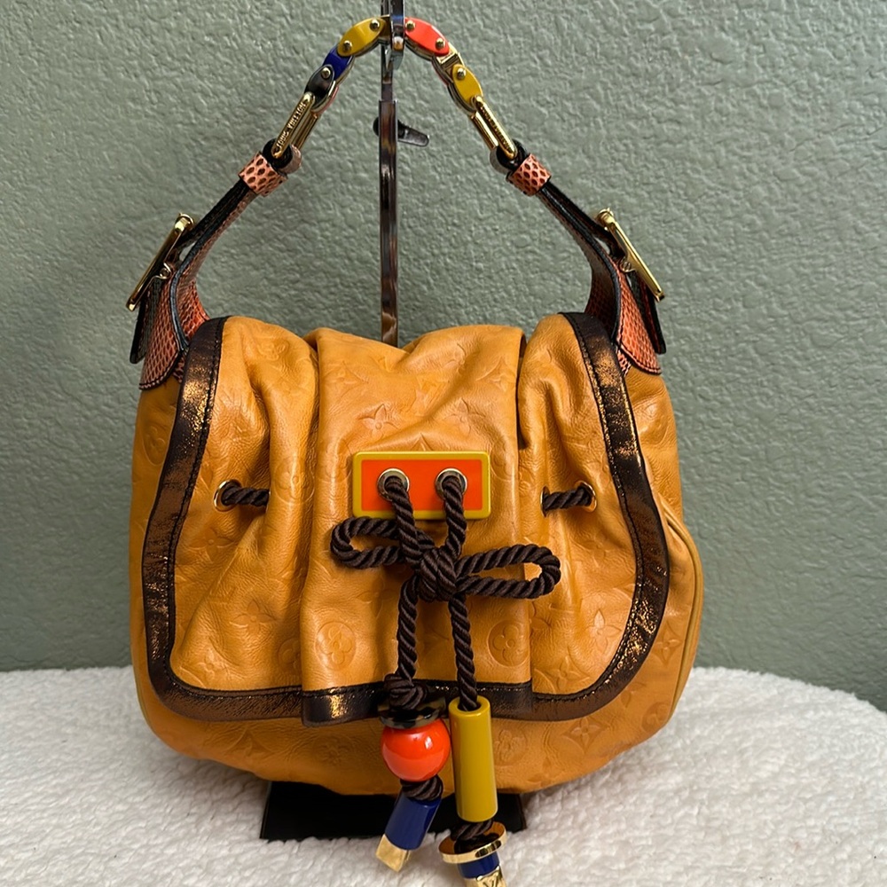 Authentic Preloved  Rare LV Kalahari PM Bag